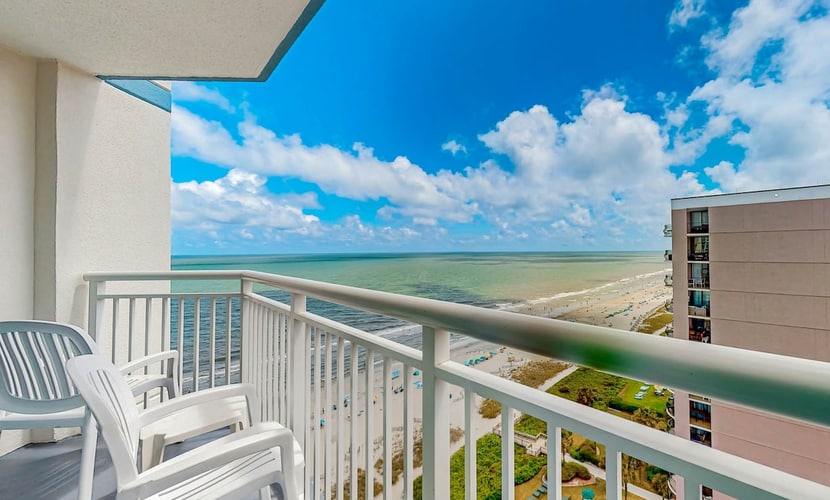 Beautiful beachfront condo with pool, hot tub, beach access, & washer/dryer
