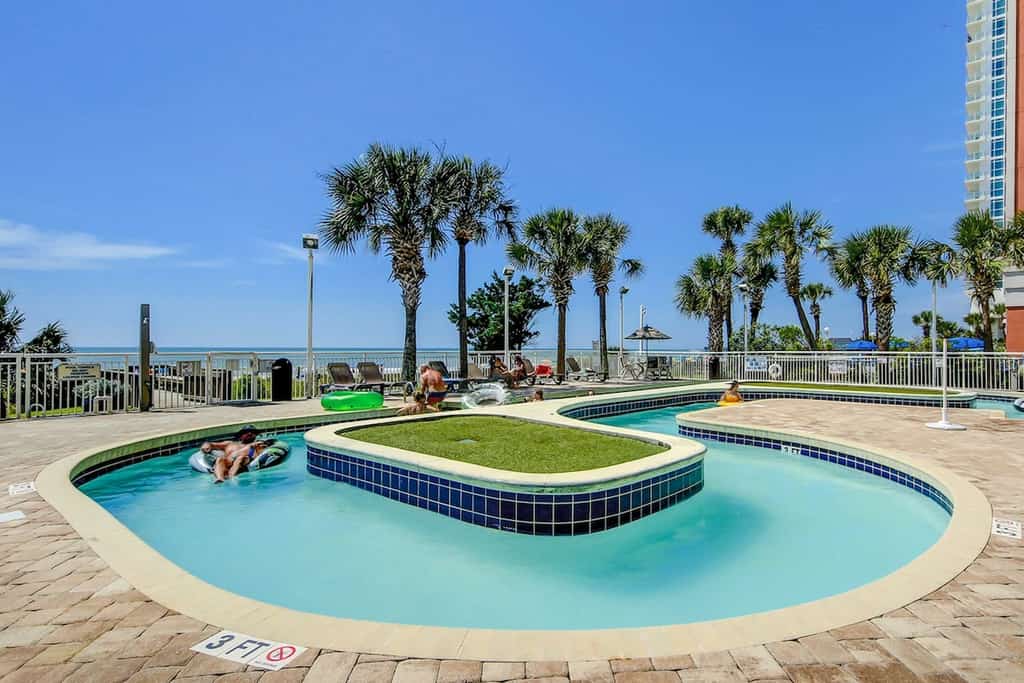 Oceanfront, penthouse-level condo with pool, lazy river, WiFi, W/D & great view