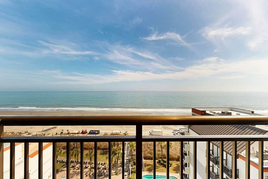Oceanfront condo with pool, hot tub, private balcony & central AC