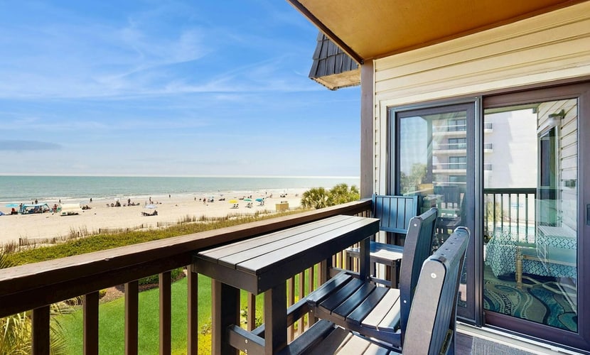 Beachfront retreat with ocean views, pool, & washer/dryer - steps to the sand