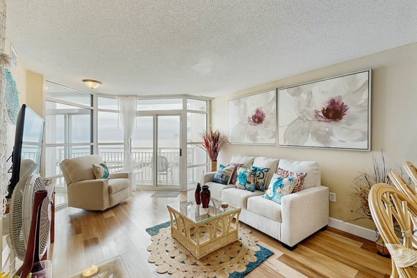 7th floor ocean-view condo with balcony, W/D & AC - direct beach access