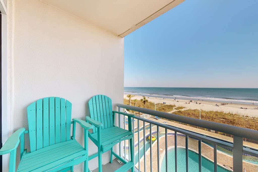Oceanfront gem with pools, lazy river, WiFi, beach access, full kitchen & AC