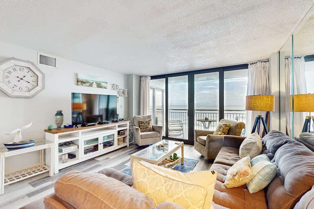Oceanfront condo with pool, private balcony, W/D & direct beach access