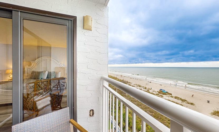 Oceanfront condo with pool, private balcony, W/D & direct beach access