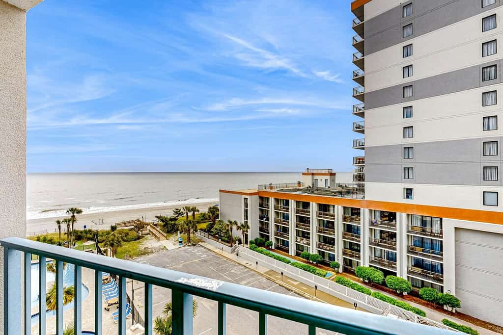 Beachfront resort with indoor/outdoor pools, lazy river, hot tub, gym