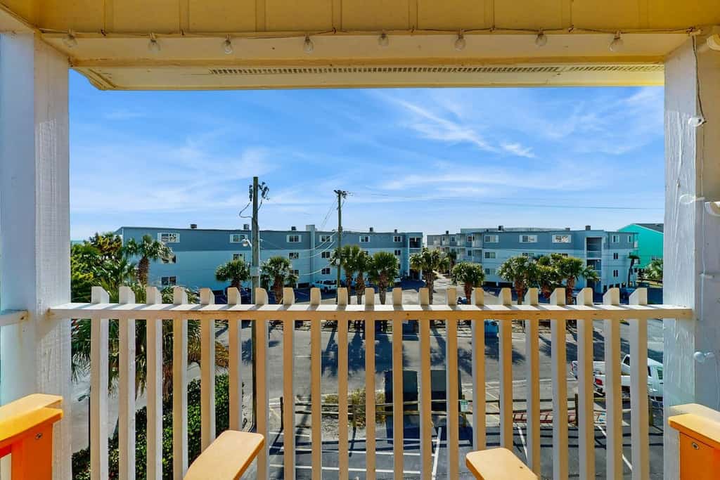 Oceanview condo with pool, private balcony, W/D & steps to beach