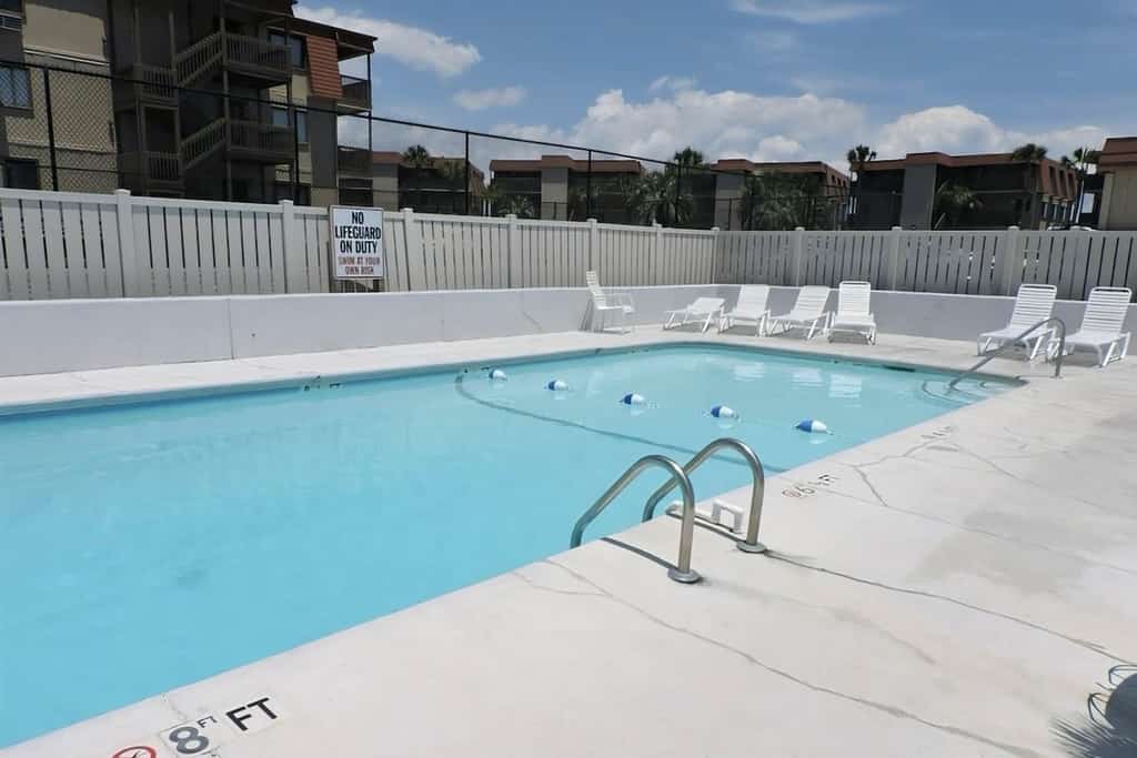 Oceanview condo with pool, private balcony, W/D & steps to beach