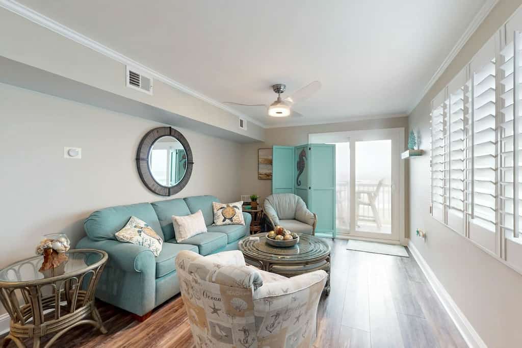 Beachfront condo with ocean views, pool, beach access, W/D, & AC