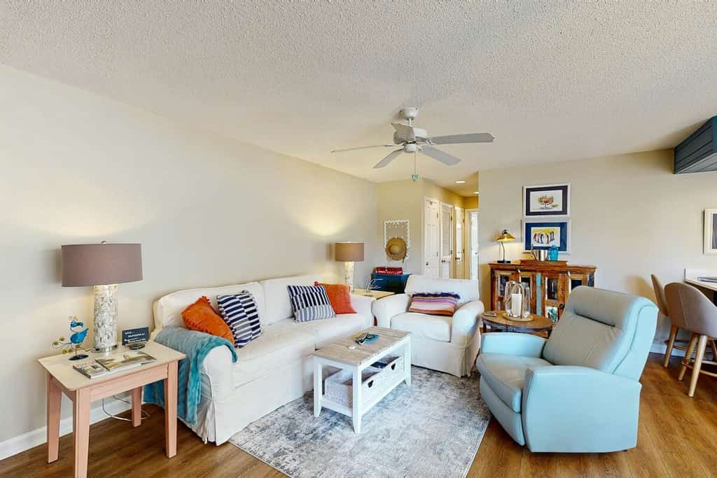 Pool view condo with balcony, pool, hot tub & steps to beach