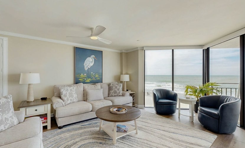 Oceanfront condo with pool, balcony views & proximity to local attractions
