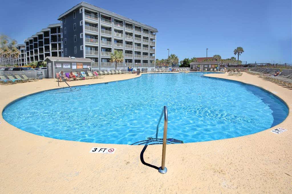 Sixth-floor condo with pools, hot tubs, gym, sports courts, & beach access