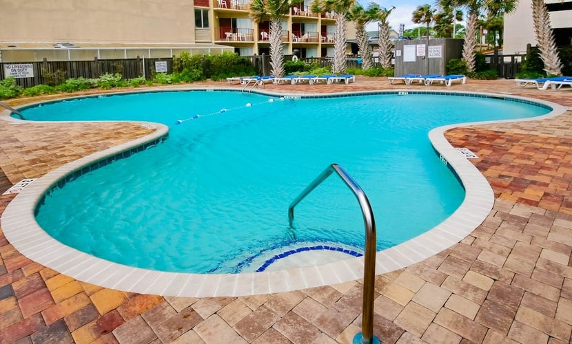 Ocean-view condo with beach access, pool, hot tubs, putting green, gym, & sauna