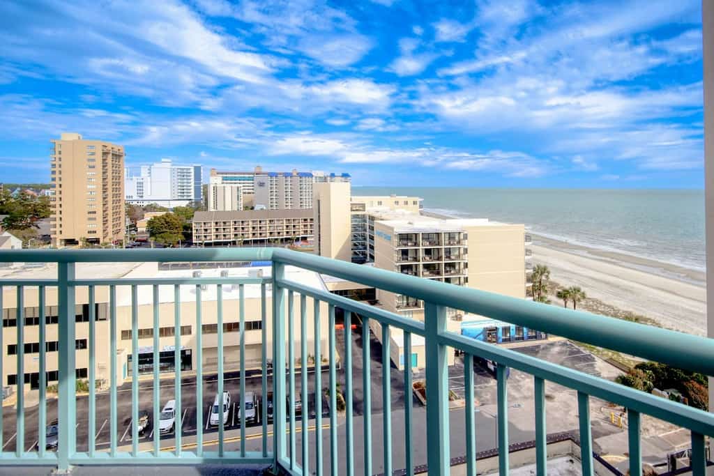 Oceanfront condo with wraparound balcony, pools, gym, & washer/dryer