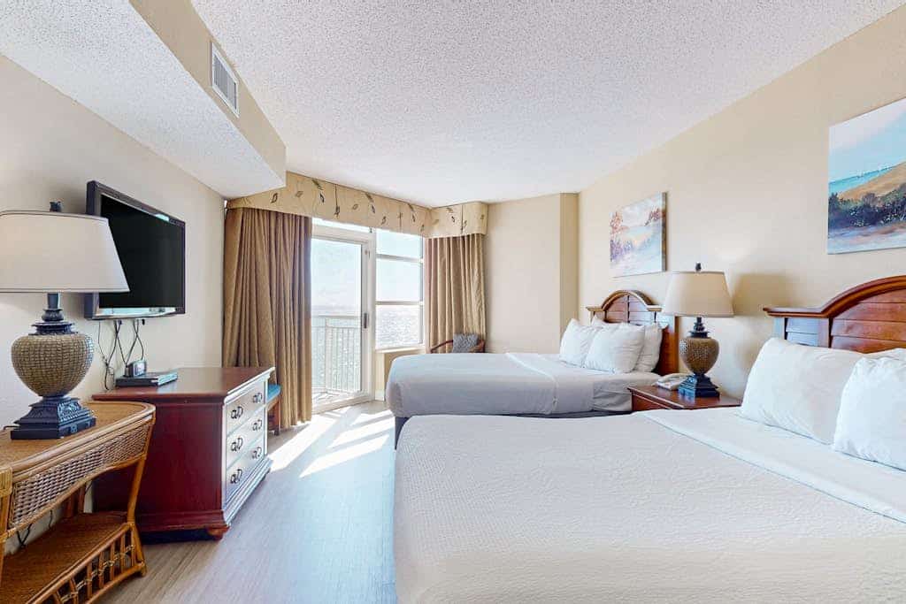# Luxury Oceanfront Suite at Carolinian | Unit 1132

Welcome to **Carolinian Beach Resort Unit 1132**, a beautifully furnished oceanfront suite designed for relaxing, recharging, and making unforgettable Myrtle Beach memories. With sweeping Atlantic Ocean views, stylish beach-inspired décor, and direct access to the beach, this condo offers an exceptional coastal escape.