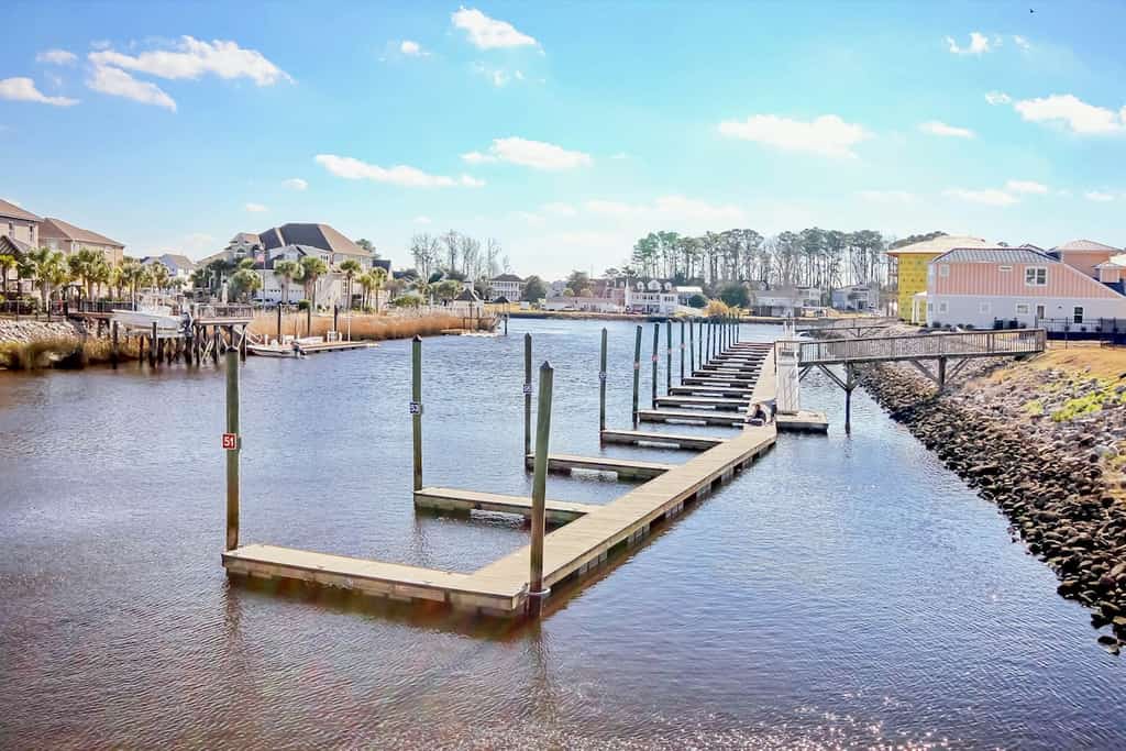 Riverfront condo with WiFi, washer/dryer, central AC, balcony with a view