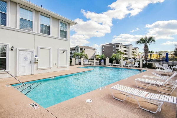 Riverfront condo with WiFi, washer/dryer, central AC, balcony with a view