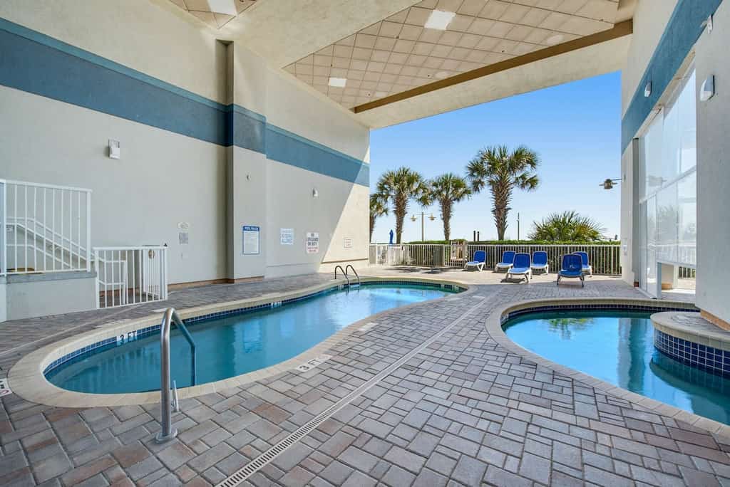 Your search for the perfect Myrtle Beach getaway ends here! Welcome to this beautifully maintained 1-bedroom, 1-bath condo at the Carolinian Beach Resort, offering a comfortable retreat for couples, small families, or groups of up to 4 guests.

Located on the 10th floor, this inviting condo features a king-size bed in the bedroom and a sleeper sofa in the living room, comfortably sleeping up to 4 guests. Enjoy a partial ocean view, relax in the comfortable living space, and take advantage of the convenience of a private washer and dryer and central air conditioning.