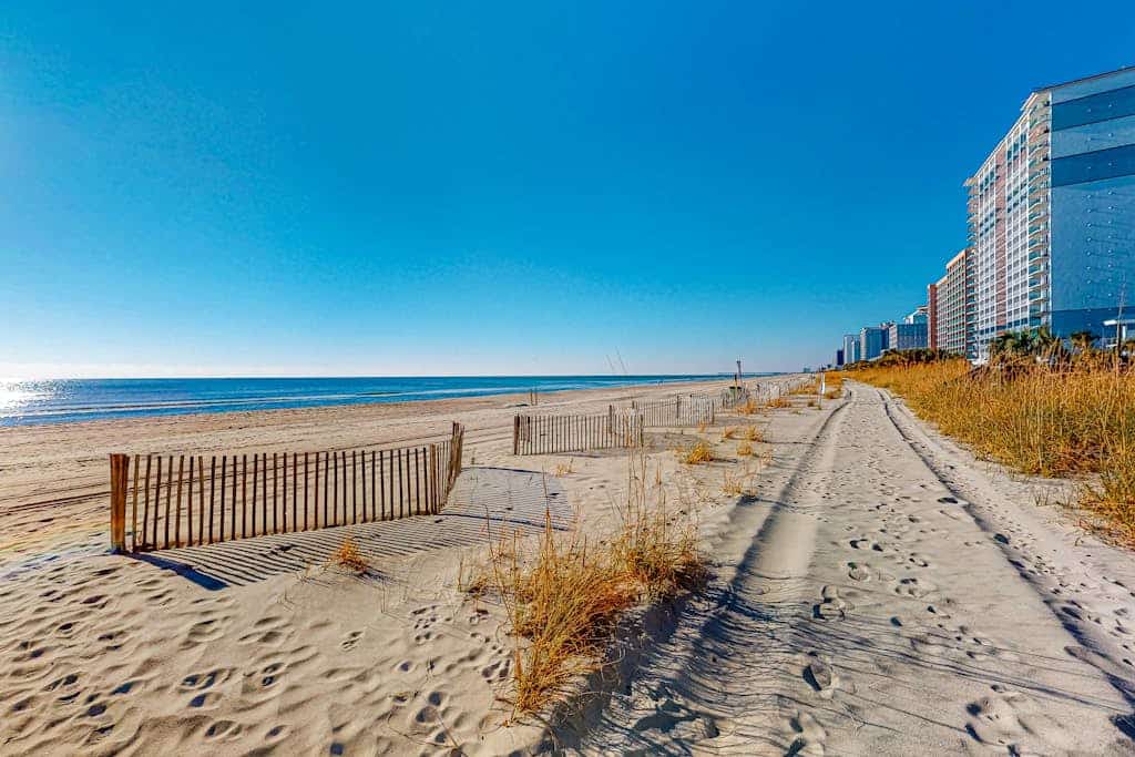 Oceanfront condo with direct beach access, pools, hot tub, & water-view balcony