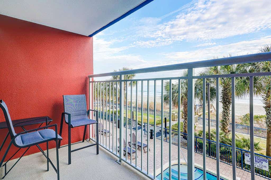 Oceanfront condo with direct beach access, pools, hot tub, & water-view balcony