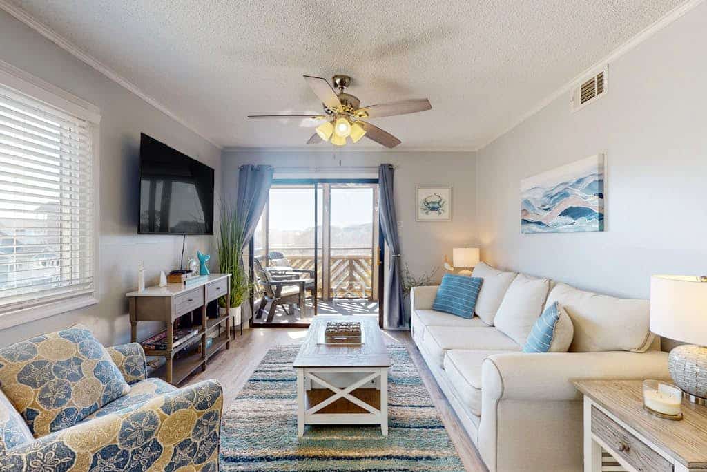 Ocean-view condo, 1 block from beach with enclosed balcony & pool