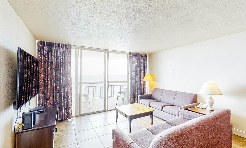 Oceanfront condo with amazing views, beach access, pool, hot tub, & balcony