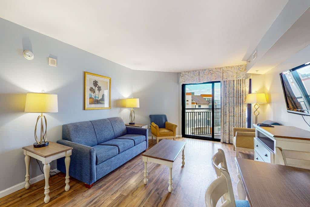 Ocean-view condo with beach access, pools, splash pad, lazy river, AC, & balcony