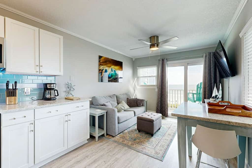 Coastal condo with ocean views, grilling area, and balcony