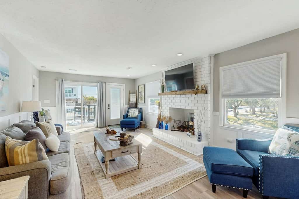 Waterfront home with dock, deck, firepit, grill, kitchen & wet bar