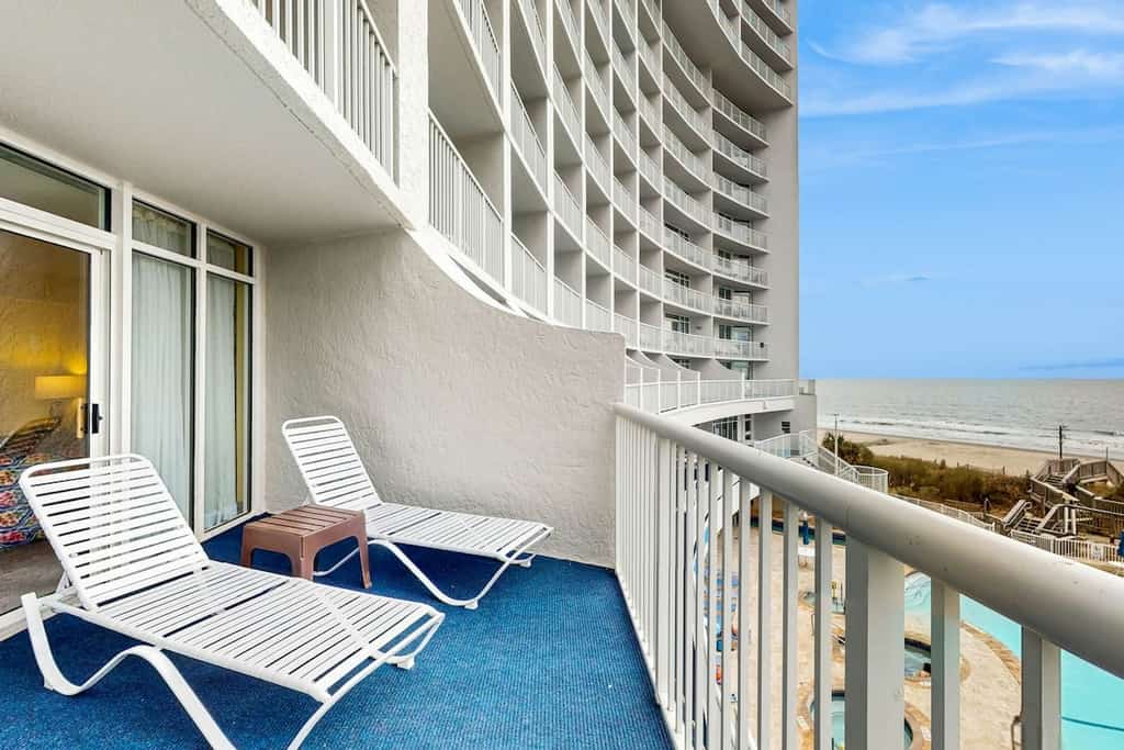 Oceanfront condo with pool, hot tub, private balcony & central AC