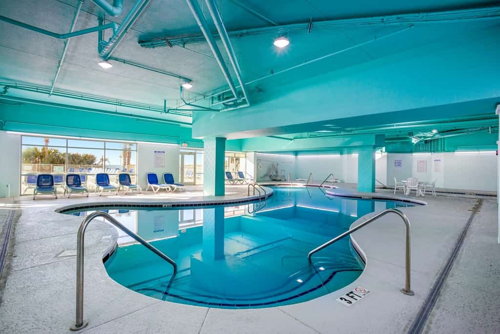 Oceanfront condo with private balcony, pool & direct beach access
