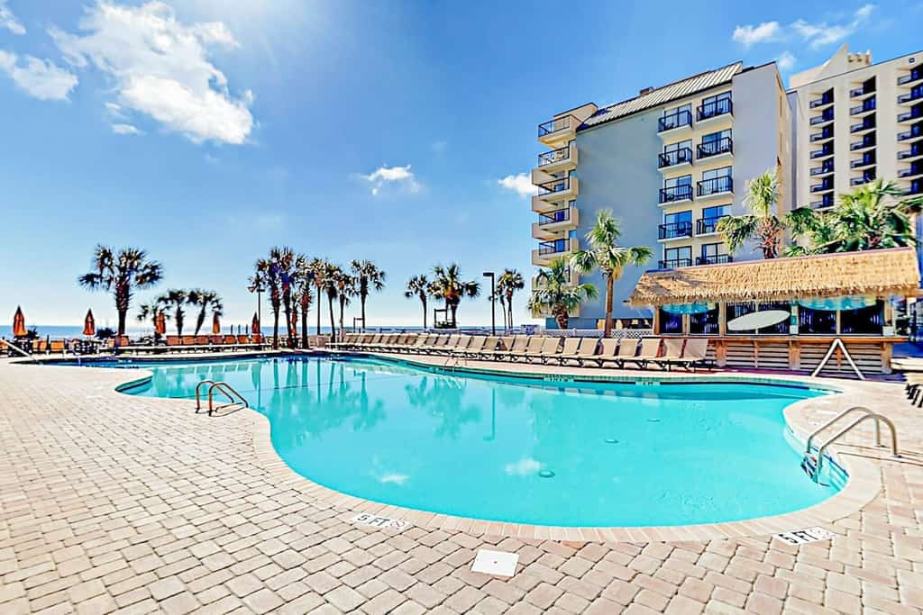 Oceanview studio with pool, private balcony & beach access