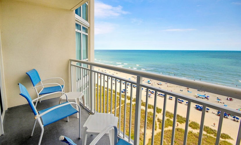 Oceanfront condo with beach views, WiFi, balcony, pools, hot tubs, & lazy river