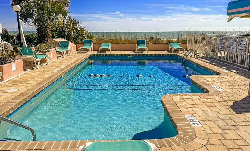 Beachfront condo with ocean views, on-site pool, WiFi - snowbird friendly
