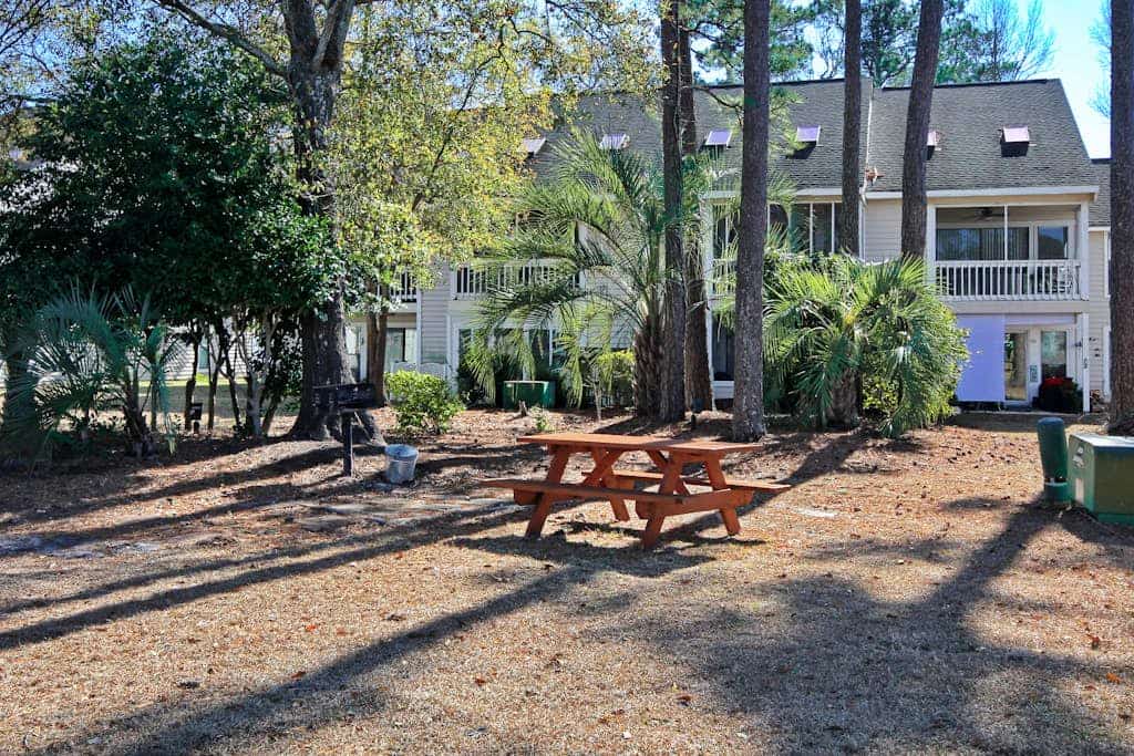 Loft condo near beach & golf with covered porch, tennis, balcony, & grill