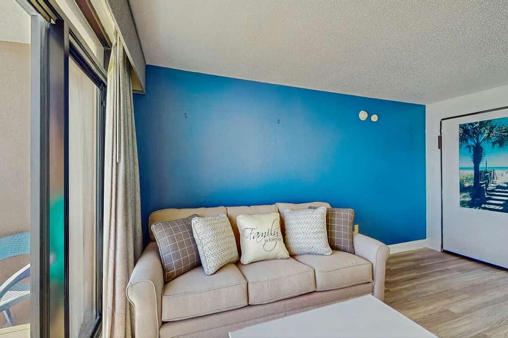 Oceanfront condo with balcony, A/C, & beach access