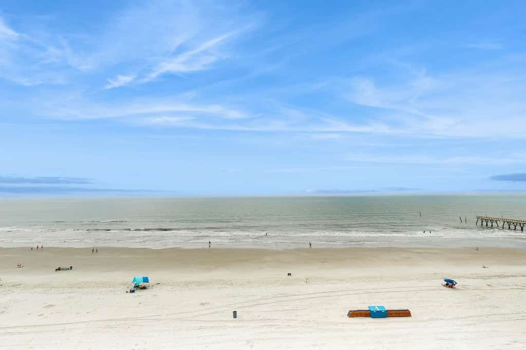 Oceanfront condo with spacious private balcony, pool & direct beach access