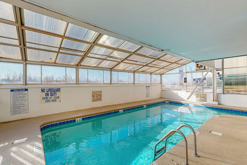 Oceanfront condo with spacious private balcony, pool & direct beach access