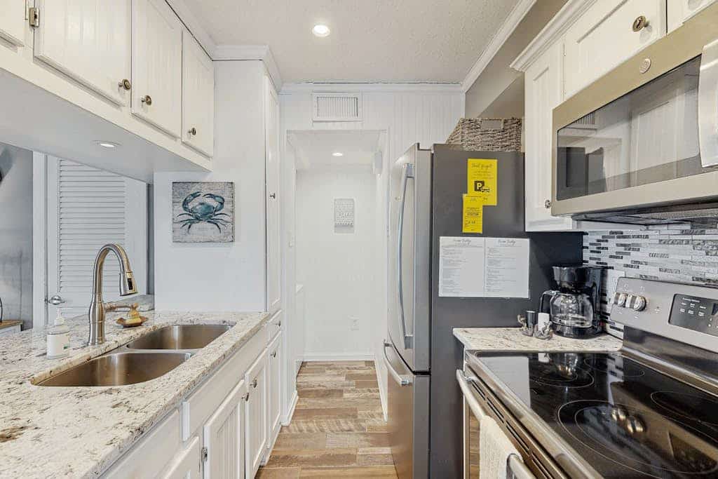 Ocean and pier-view condo with pool access & private balcony - walk to beach