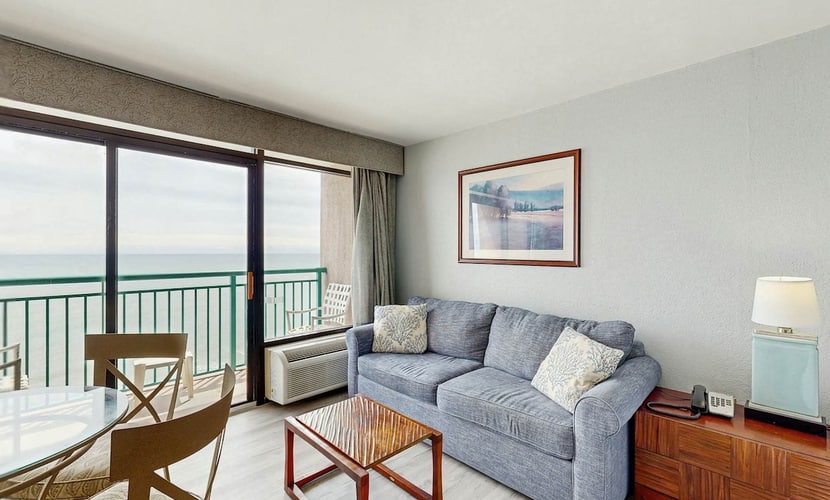 Oceanfront studio with private balcony, pool & direct beach access
