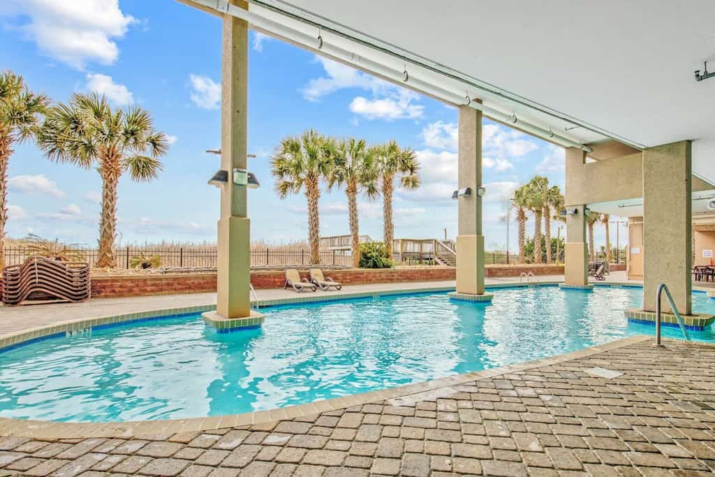 9th-floor oceanfront condo with indoor pool, balcony, central AC & full kitchen