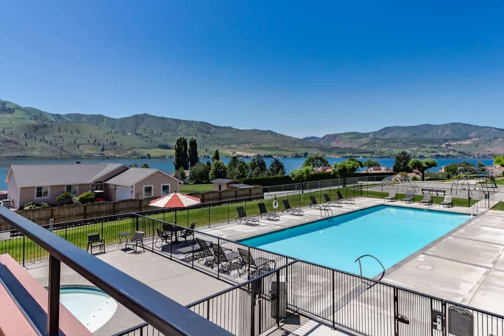 Waterfront Condo with Shared Pool, Hot Tub, Dock, and Free WiFi - Walk to Lake