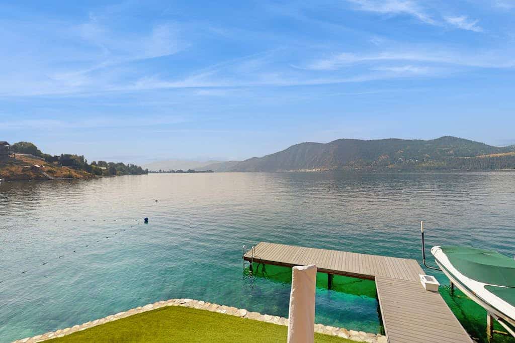 Stunning home on the water with large deck, private dock, firepit