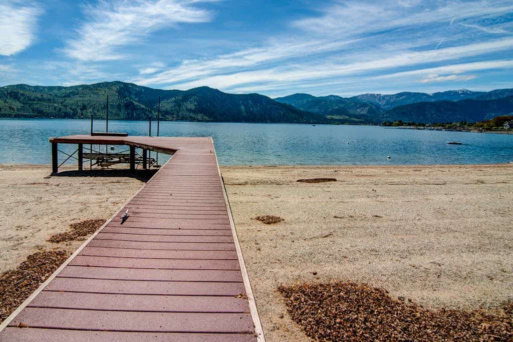 Lakefront home with private dock, firepit, & views