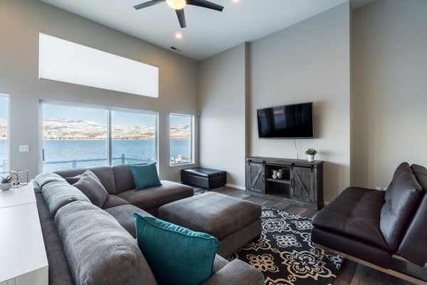 Modern lakefront home with private dock, amazing sunset views, & chef's kitchen