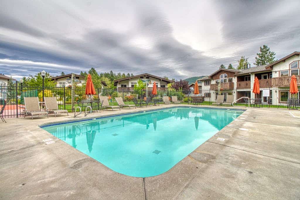 Sunny condo w/ a balcony, shared pools, hot tub, game room - near downtown
