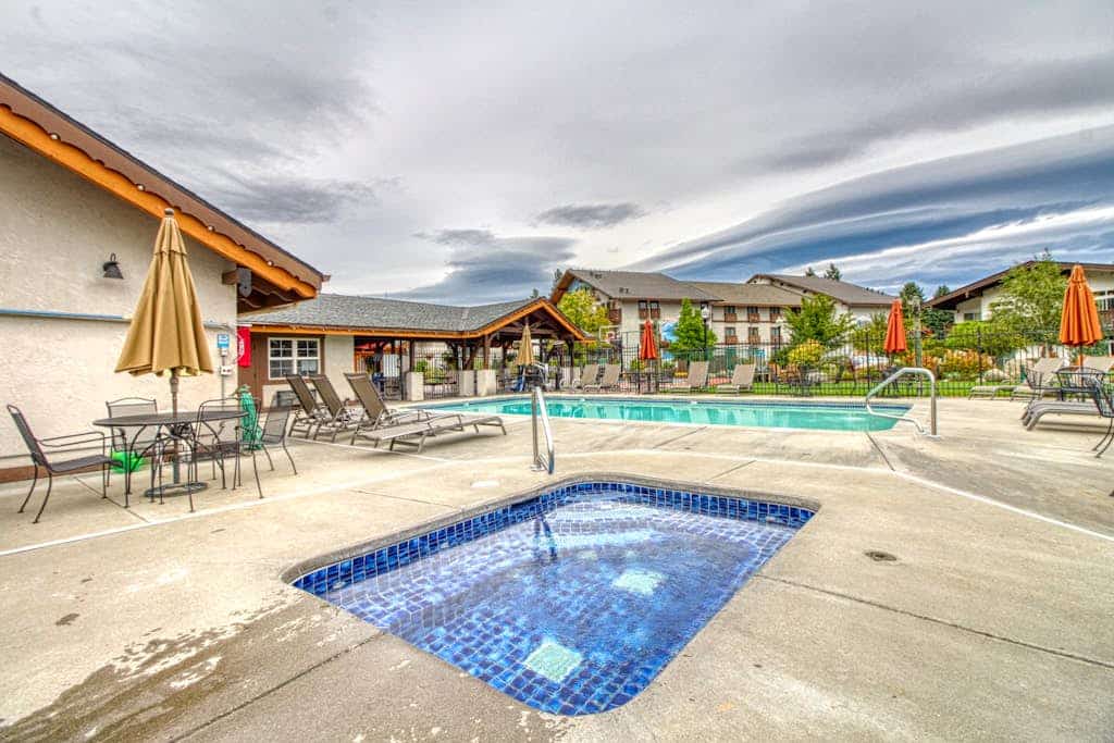 Sunny condo w/ a balcony, shared pools, hot tub, game room - near downtown