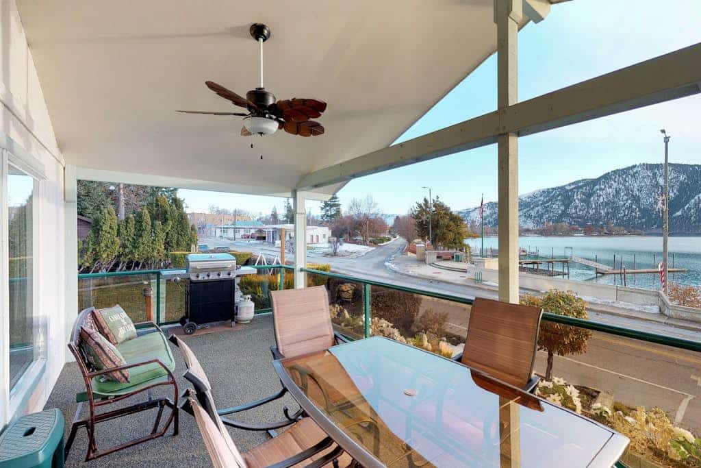 Lakeview home with wrap-around deck, easy lake access, private hot tub, & more