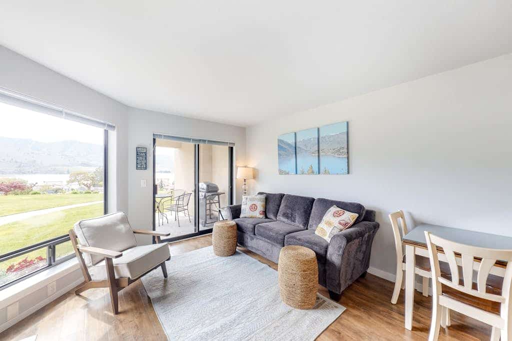 Bright Waterfront Condo with Lake & Mountain Views, Shared Pools & Hot Tubs