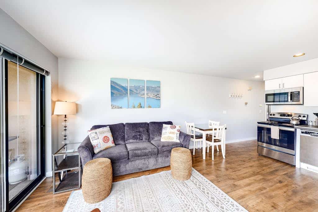 Bright Waterfront Condo with Lake & Mountain Views, Shared Pools & Hot Tubs