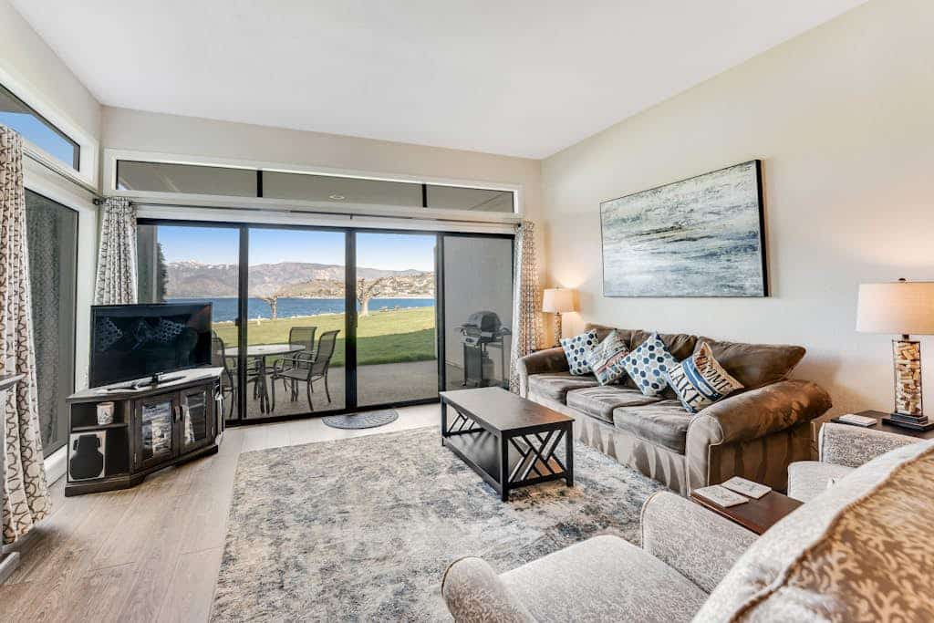Comfy Lakefront Condo with Water Views, Shared Pool & Hot Tub